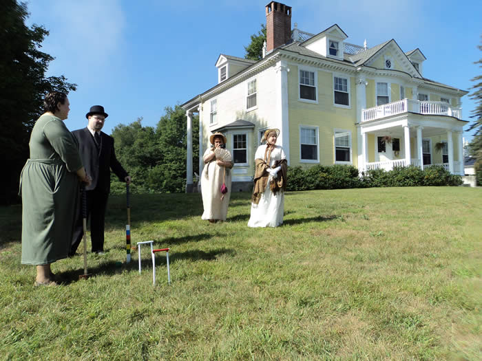 playing croquet on the lawn with The Governor's House in Hyde Park in the background