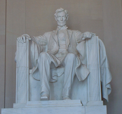marble statue of seated Abraham Lincoln by Daniel Chester French