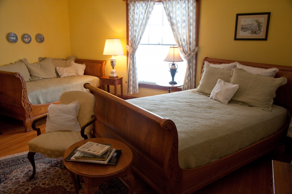 two sleigh beds, one queen-sized and one twin